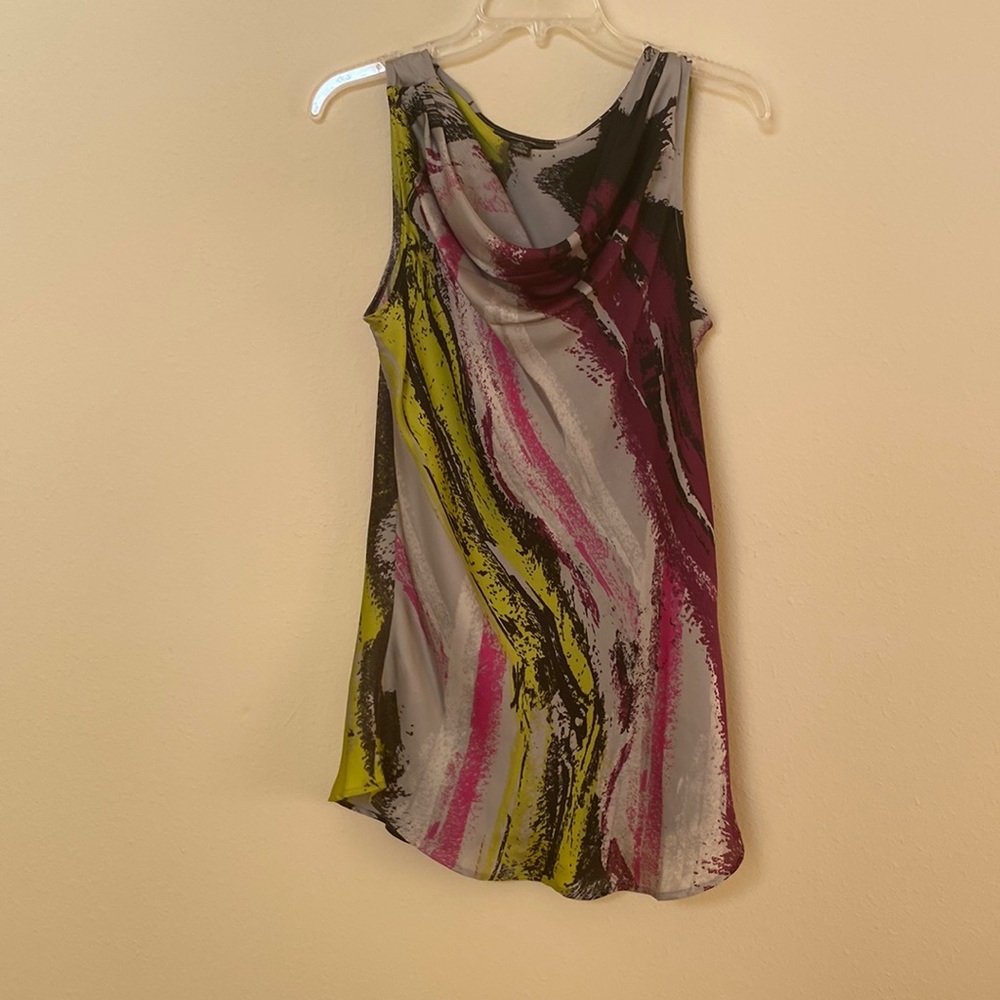 Sleeveless shirt, long, very cute, used but in great condition